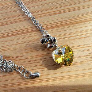 Swarovski Women's Silver and Yellow heart necklace